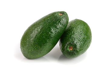 whole avocado isolated on white background close-up