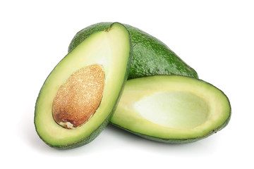 whole and half avocado isolated on white background close-up. Top view