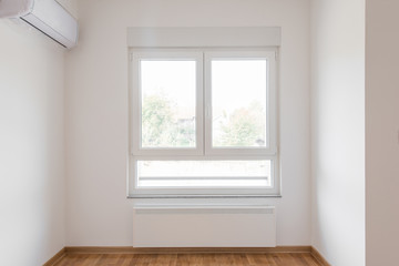 Fototapeta na wymiar Window in new empty apartment