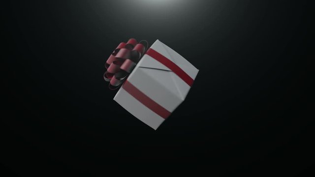 Geschenk mit roter Schleife dreht sich