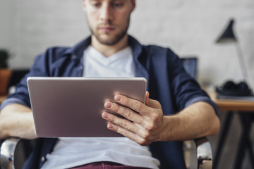 Man Using Tablet