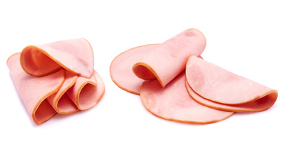 Cooked boiled ham sausage or rolled bologna slices isolated on white background with herbs and spices © zing