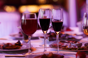 Glasses of wine on the table.