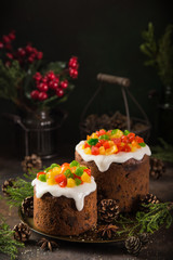 Traditional Christmas fruit cake on dark background