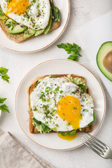 toast with avocado, spinach and fried egg