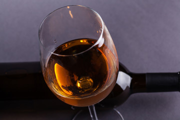White wine glass and bottle