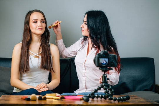 blogging, technology, videoblog, makeup and people concept - happy smiling woman or beauty blogger doing makeup from her client