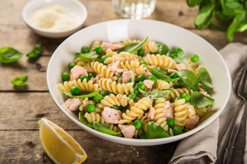 fusilli pasta with salmon, spinach and grean peas