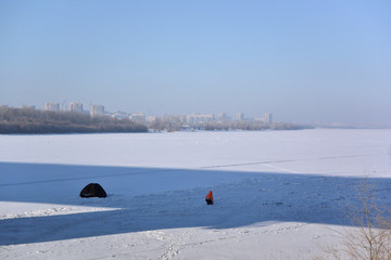 Winter ice fishing on the river Irtysh