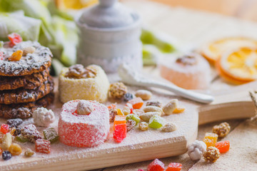 East sweets with fruits, nuts and sugar powder