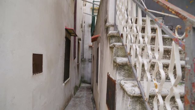 15166_A_stairs_going_up_the_house_with_the_small_street.mov