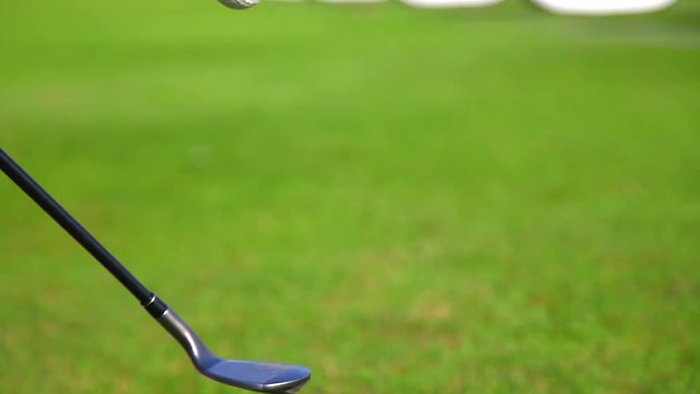 Golfer Bouncing Golf Ball on Club 