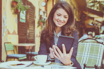 Young business woman using technology .