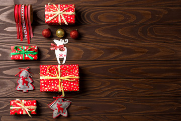 Christmas background with colorful decorations on an old wooden table