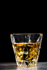 Crystal glass with whisky or brandy