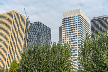modern office building with green trees