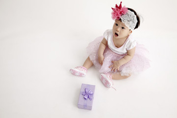 chinese girl with party dress with surprise expression