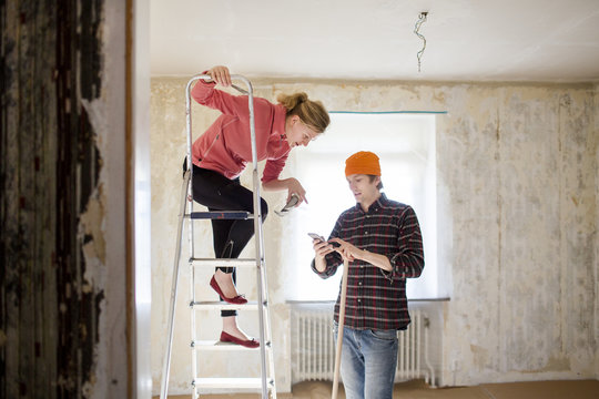Couple doing house renovation