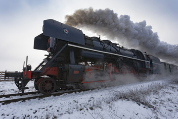Obraz na płótnie Canvas vinatge locomotive in action