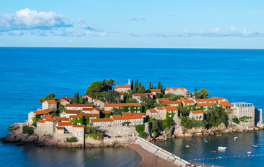 Watching the sunrise at Saint Stephen (Sveti Stefan), Adriatic Sea, Balkan Peninsula, Montenegro, Europe