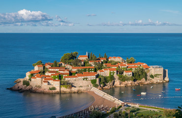 Watching the sunrise at Saint Stephen (Sveti Stefan), Adriatic Sea, Balkan Peninsula, Montenegro, Europe