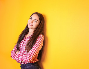 Fototapeta premium Beautiful smiling woman on color background