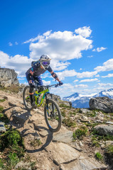 Fototapeta na wymiar Mountain biking in Whistler, British Columbia, Canada - summer 2017. Top of the world trail