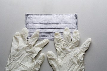 Dust mask and Medical glove on table in Laboratory.