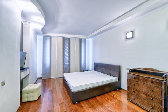 Modern interior of a bedroom in the new house.