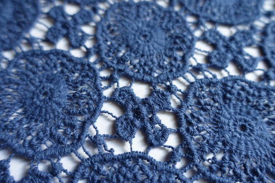 Beautiful blue cotton lace on white background