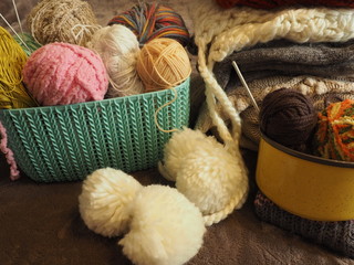 Yarn balls. Knitting as a kind of needlework.  Knitted clothes