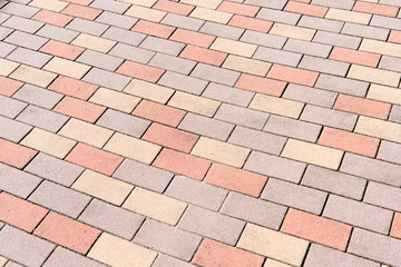 patterned paving tiles, cement brick floor background.