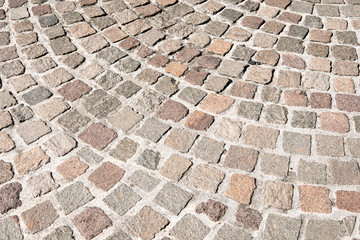 Vintage stone street road pavement texture, outdoor.