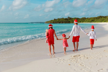 Happy family with kids on tropical Christmas vacation © nadezhda1906