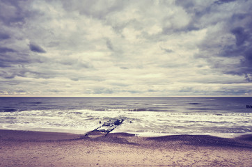 Color toned picture of an empty beach, nature background. 