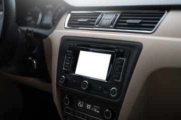 Car navigation system in modern car interior with mock up. Isolated display of multimedia.
