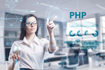 The concept of business, technology, the Internet and the network. A young entrepreneur working on a virtual screen of the future and sees the inscription: PHP