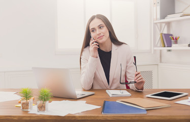 Business talk, woman consulting by phone at office