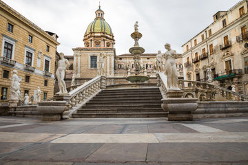 Fototapeta na wymiar Famous fountain of shame on baroque Piazza Pretoria, Palermo, Sicily, Italy