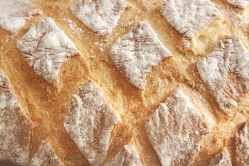 Bread texture background, closeup of baguette loaf