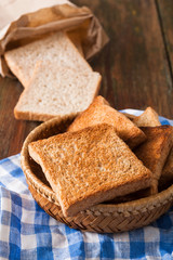 Breakfast background, toasts on checkered napkin closeup