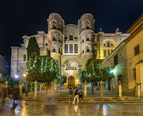 Fototapeta na wymiar Christmas light decorations around the cathedral in Malaga, Spain