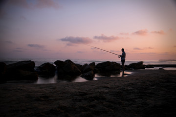 Angler am Strand 