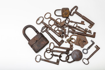 Close up view of old  padlock and keys on a white  background with copy space