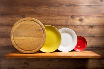 plate at kitchen wooden shelf at wall