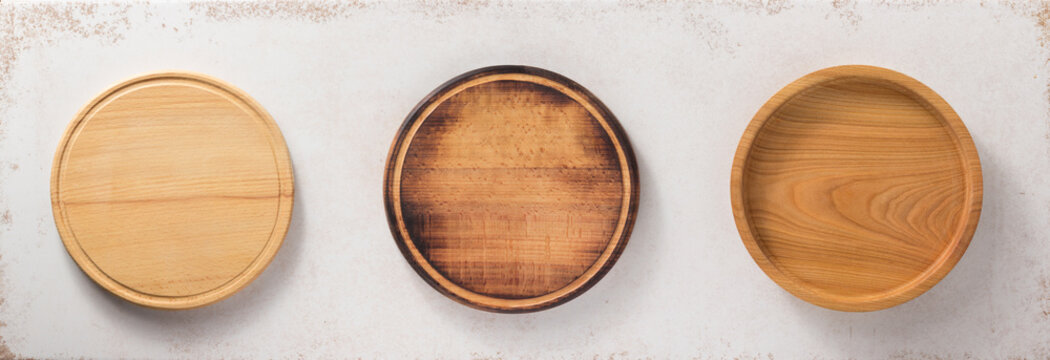 Round Cutting Board At Abstract Background