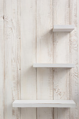 wooden shelves at white background
