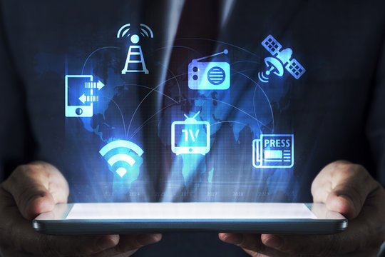 Media concept on tablet with hologram