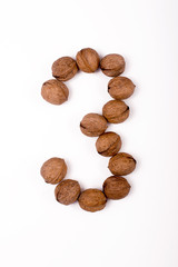 figure three nuts on white background, isolated