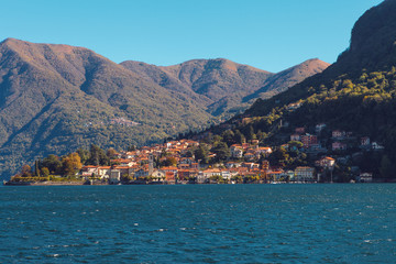 Fototapeta na wymiar City located on the shore of Lake Como, Italy.